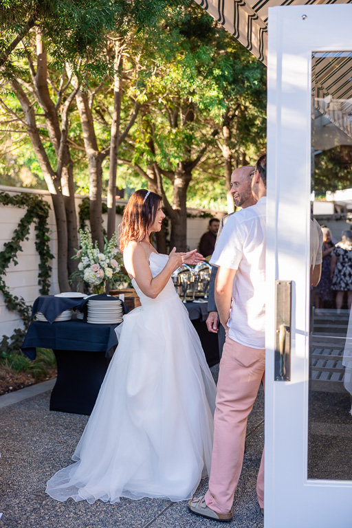 candid capture of bride and some guests