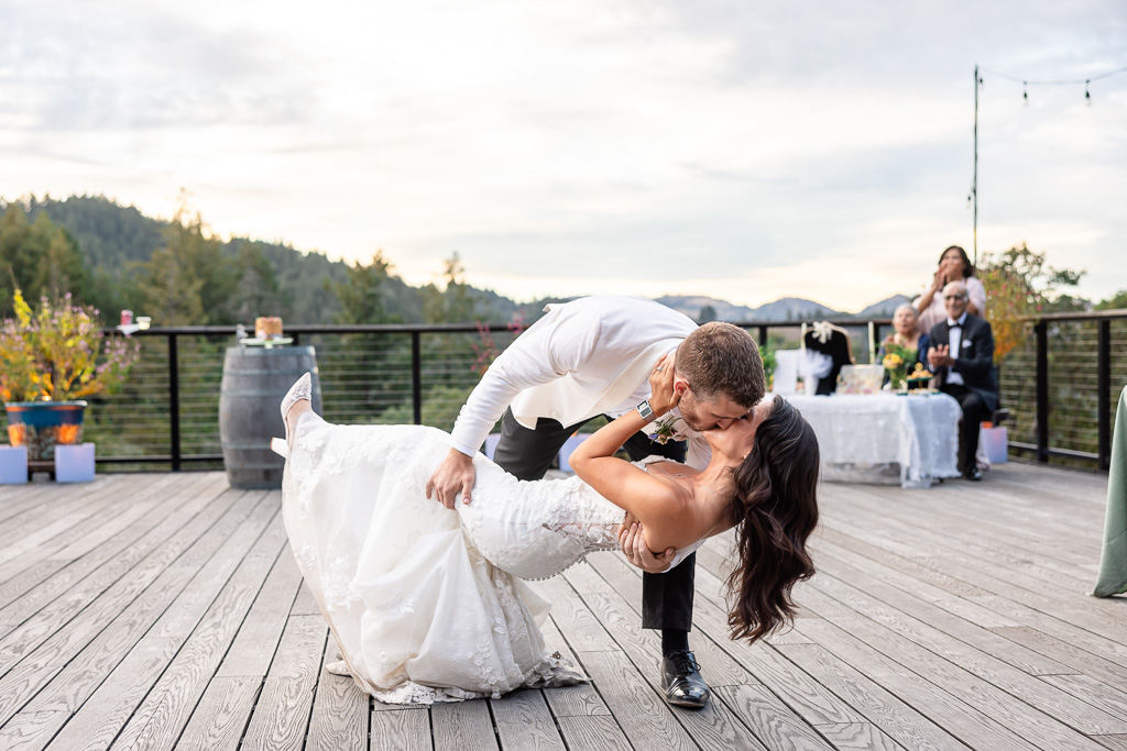 dip and kiss at the end of outdoor first dance
