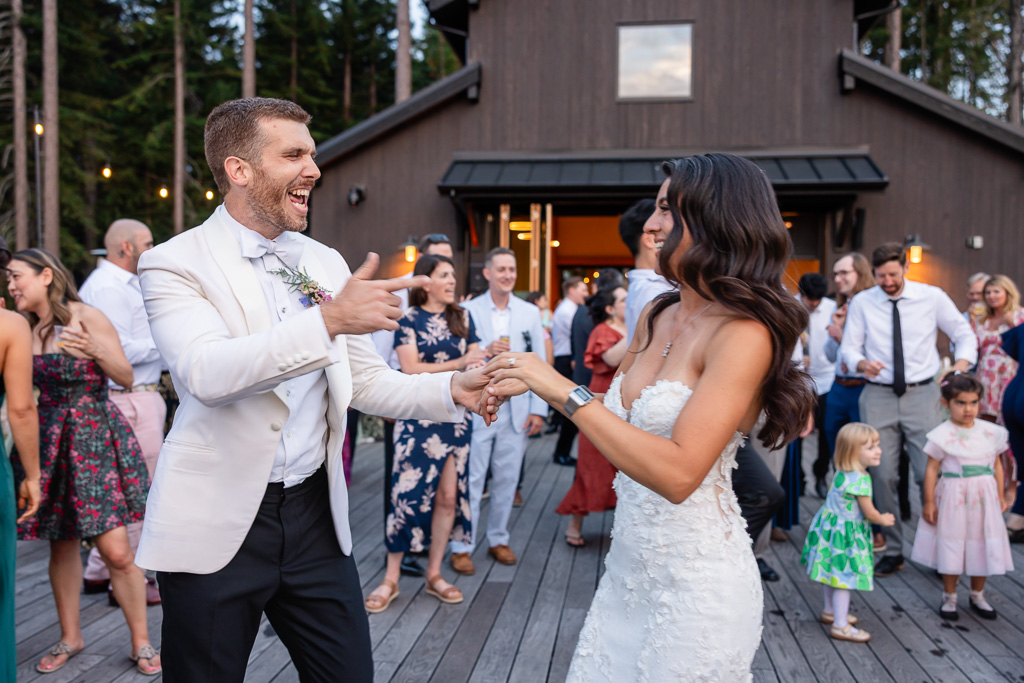 bride and groom opening up the dance floor