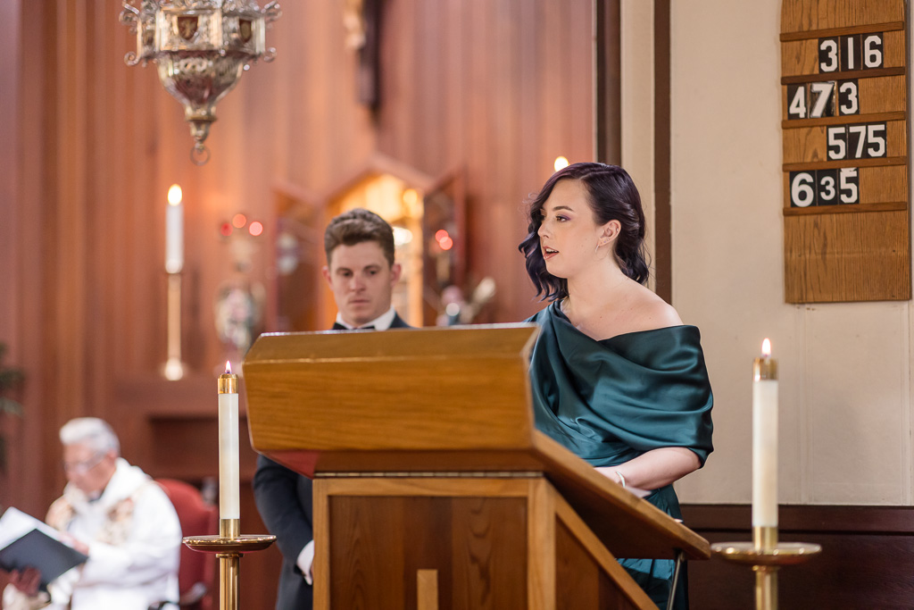 bridesmaid performing a reading