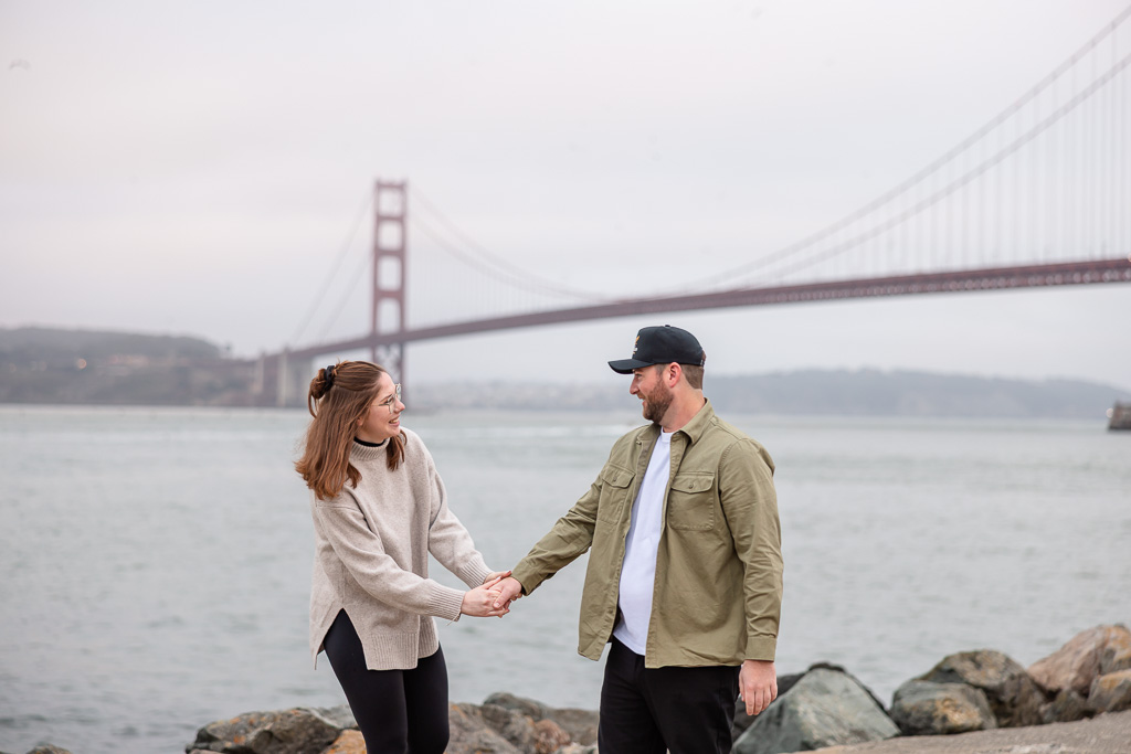 cute candid engagement photo idea