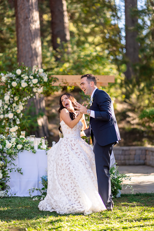 Bride and groom share a fun first dance moment