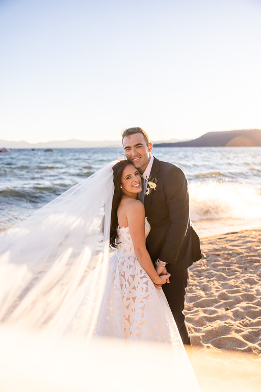 Bride and groom embrace for a Lake Tahoe golden hour wedding portrait