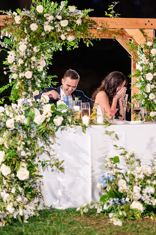 Bride and groom reaction to funny speech