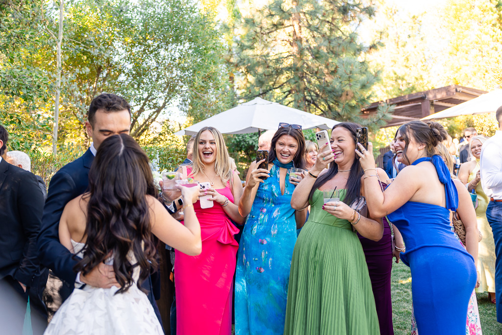 Bride greets guests at the outdoor wedding reception