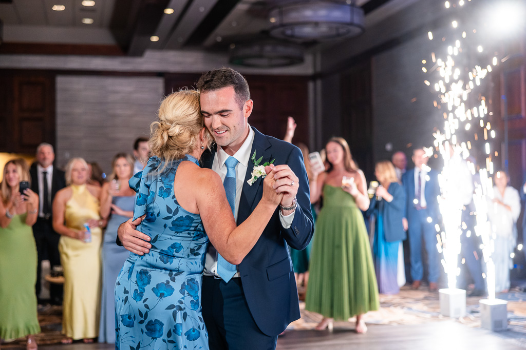 mother/son dance in the ballroom as sparklers fire upwards