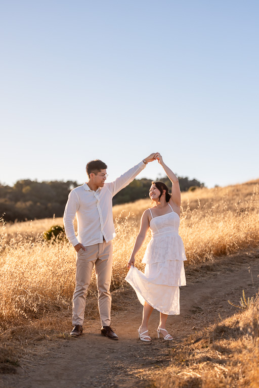 sunset engagement photos on a hiking trail