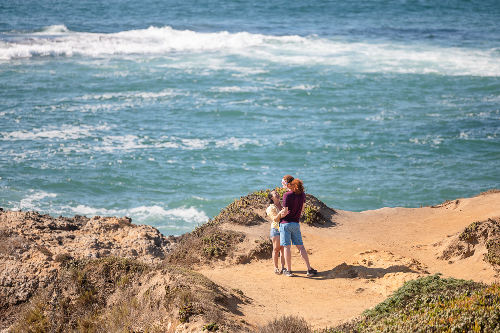 candid sneaky photo of couple at Pescadero State Beach
